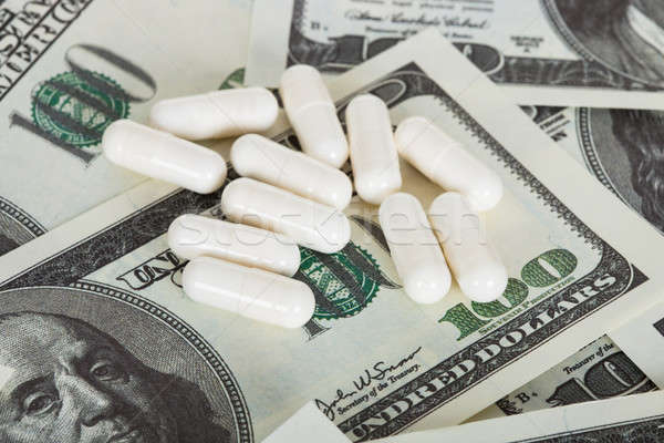 Drugs and american dollars Stock photo © AndreyPopov