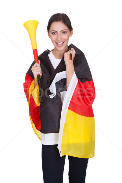 Happy Female German Supporter With Vuvuzela Stock photo © AndreyPopov