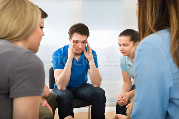 Depressed Man With His Friends Stock photo © AndreyPopov