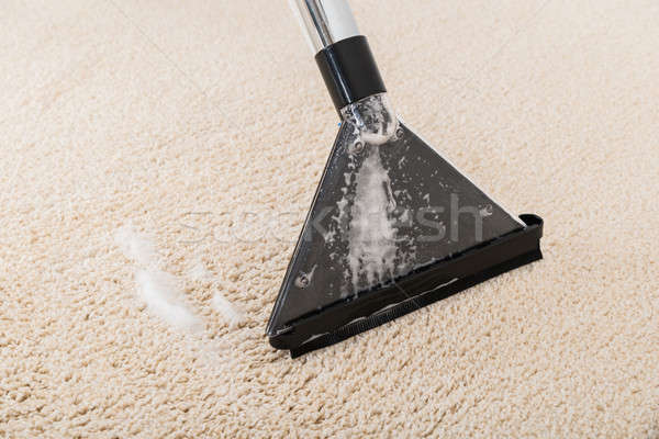 Stock photo: Vacuum Cleaner On Rug