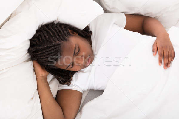 Nina dormir cama vista África nino Foto stock © AndreyPopov