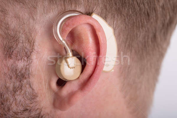 Mann tragen Hörgerät Medizin helfen Stock foto © AndreyPopov