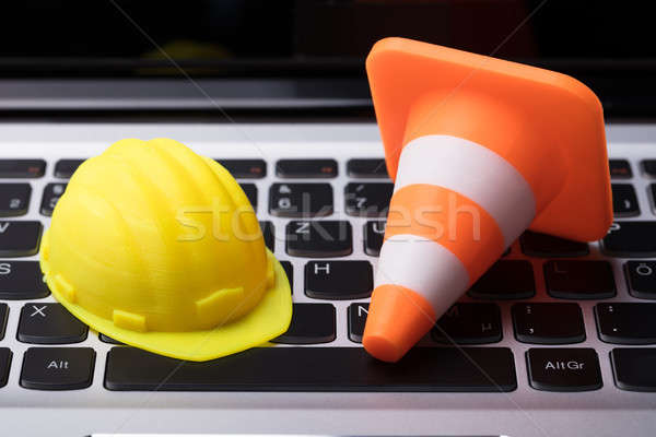 Close-up Of Hard Hat And Traffic Cone Stock photo © AndreyPopov