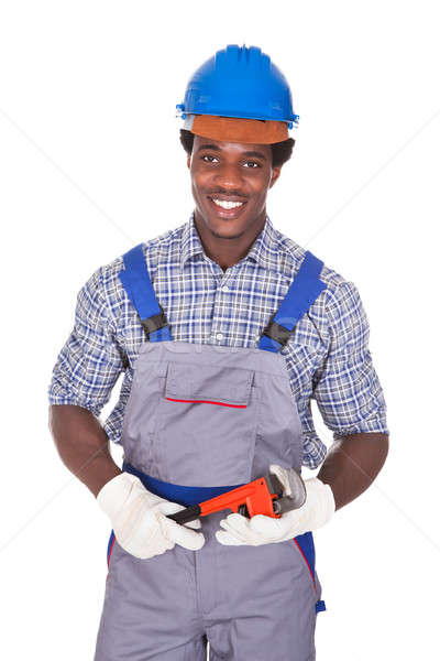 Plumber Holding Pipe Wrench Stock photo © AndreyPopov