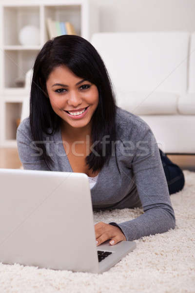 Young Woman Using Laptop Stock photo © AndreyPopov