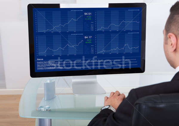 Businessman Checking The Stock Market On Computer Stock photo © AndreyPopov