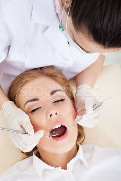 Stock photo: Young Woman Having Dental Checkup