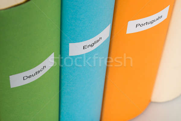 Diferente idioma libros primer plano Inglés negocios Foto stock © AndreyPopov