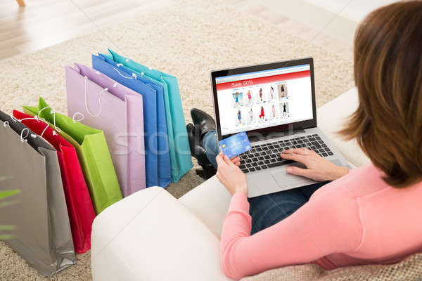 Woman With Debit Card Shopping Online Stock photo © AndreyPopov