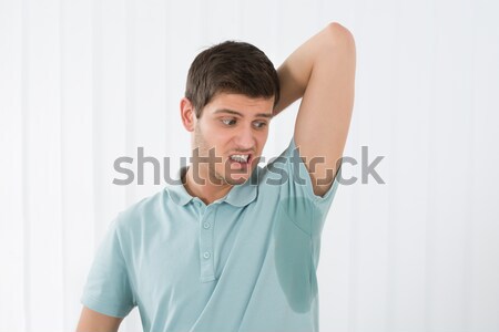 Man Sweating Very Badly Under Armpit Stock photo © AndreyPopov