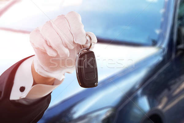 Valet Boy Hand Holding Car Key Stock photo © AndreyPopov