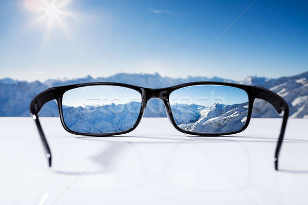 Snowcapped Mountains Seen Through Glasses Stock photo © AndreyPopov