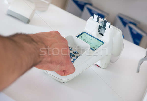 Entering pin code in card scanner Stock photo © AndreyPopov