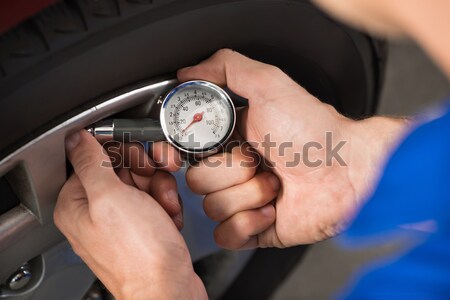 Doctor Checking Blood Pressure Of A Patient Stock photo © AndreyPopov