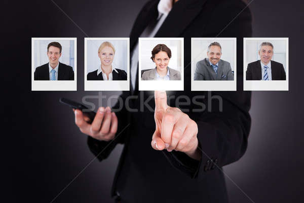 Man Selecting A Profile Picture Stock photo © AndreyPopov