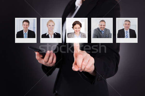 Stock photo: Man Selecting A Profile Picture