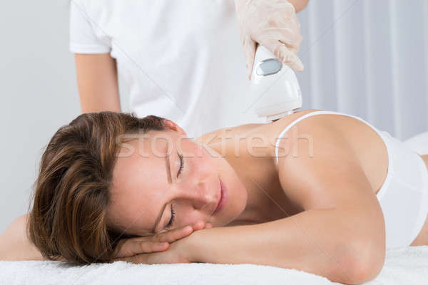 Woman Getting Epilation Laser Treatment Stock photo © AndreyPopov