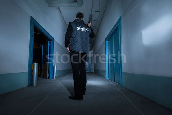 Ochroniarz stałego korytarz budynku dojrzały mężczyzna Zdjęcia stock © AndreyPopov