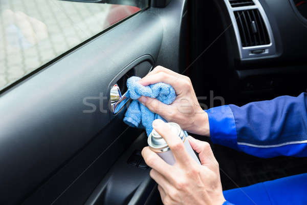 Serviceman Cleaning Car Interior Stock photo © AndreyPopov