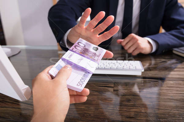 Businessperson Refusing To Take Bribe From Partner Stock photo © AndreyPopov