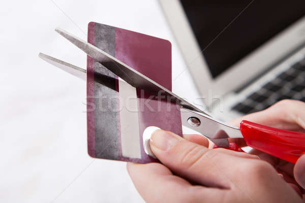 Close-up Of Hand Cutting Credit Card Stock photo © AndreyPopov