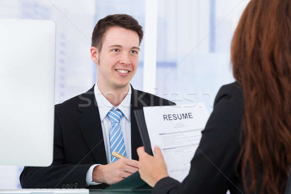 Businessman Interviewing Female Candidate In Office Stock photo © AndreyPopov