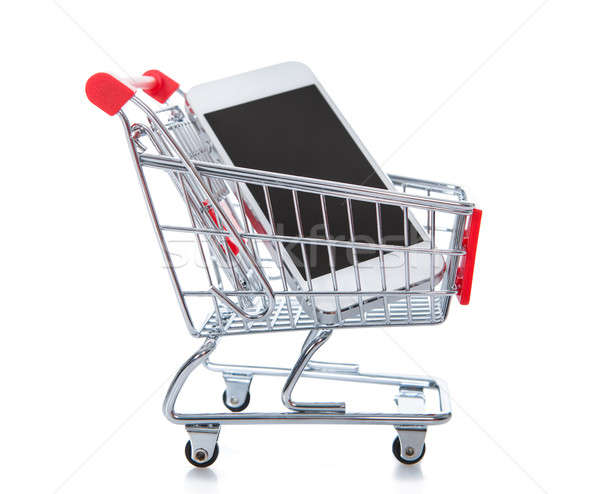 Stock photo: Wire mesh shopping trolley or cart with a phone computer inside