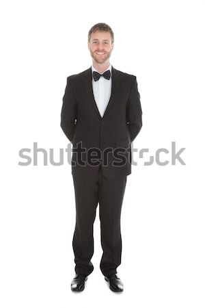 Confident Waiter Standing Hands Behind Back Stock photo © AndreyPopov