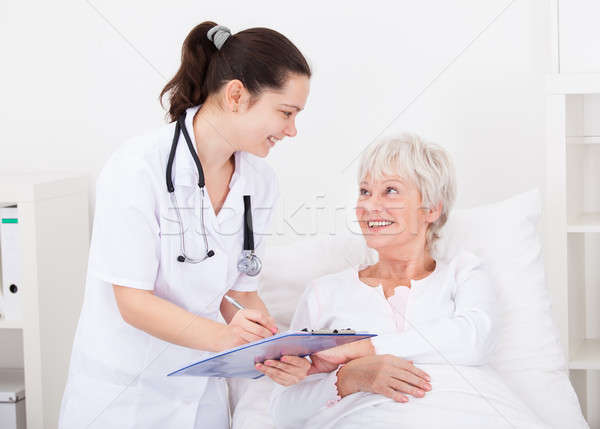 Doctor Giving Prescriptions To Patient Stock photo © AndreyPopov