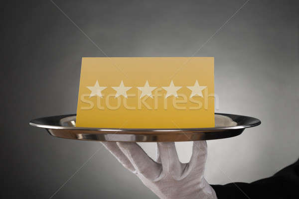 Kellner Servieren Sterne Platte Restaurant Stock foto © AndreyPopov