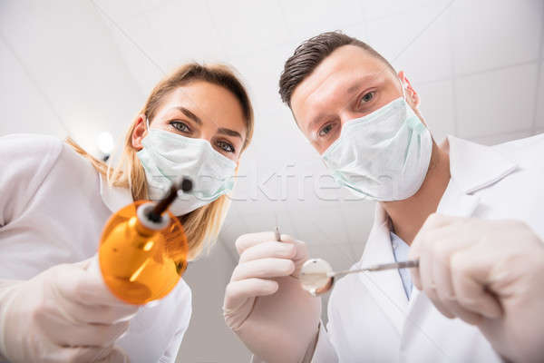 Primo persona view dentista maschio femminile Foto d'archivio © AndreyPopov