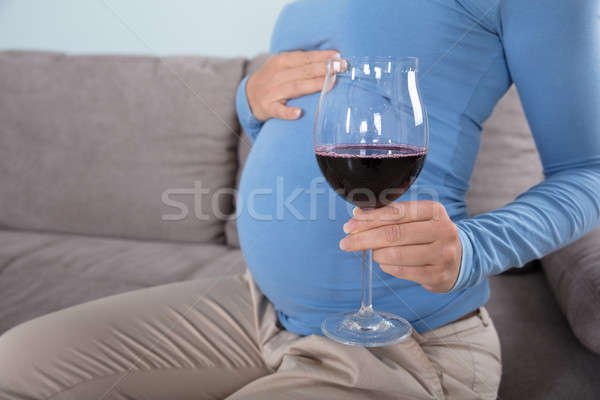 Pregnant Women Drinking Red Wine Stock photo © AndreyPopov