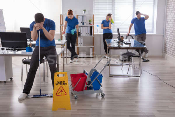 Stock foto: Müde · Büro · Gruppe · einheitliche · Reinigung