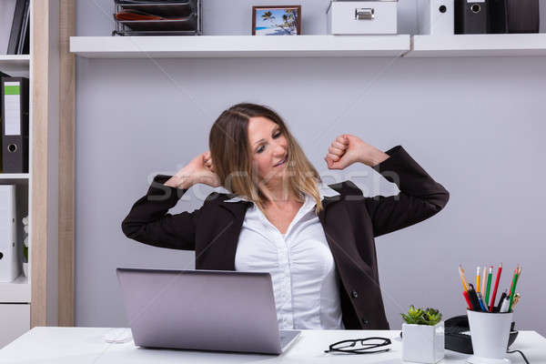 Businesswoman Stretching Her Arms Stock photo © AndreyPopov