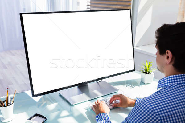 Businessman using computer Stock photo © AndreyPopov