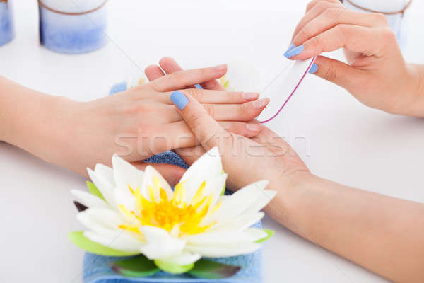 Woman Undergoing Manicure Process Stock photo © AndreyPopov