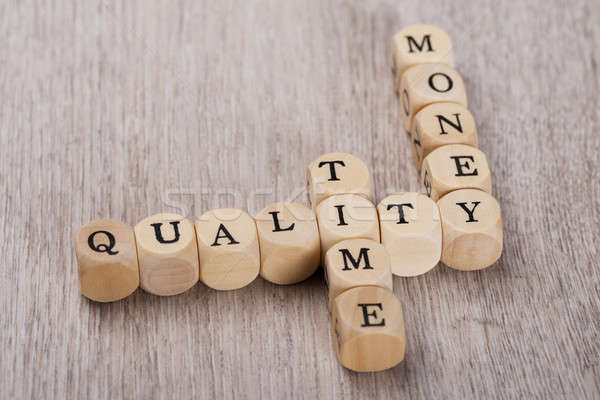 Stock photo: Quality; Time And Money Cubes Arranged On Table