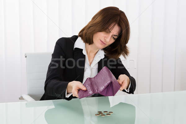Geschäftsfrau halten leer Geldbörse Euro Münzen Stock foto © AndreyPopov