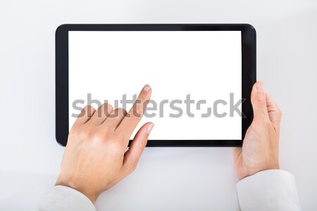 üzletember digitális tabletta fehér képernyő magasról fotózva Stock fotó © AndreyPopov