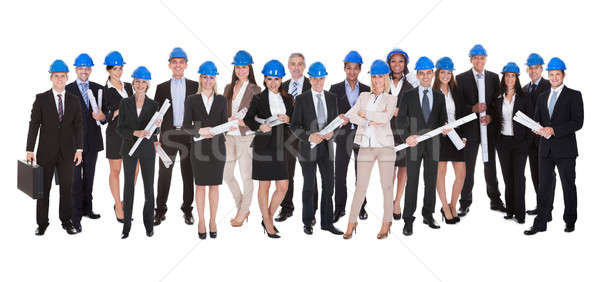 Group Of Architects With Blue Print Stock photo © AndreyPopov