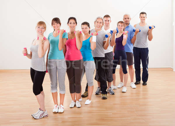 Aerobics class working out with dumbbells Stock photo © AndreyPopov