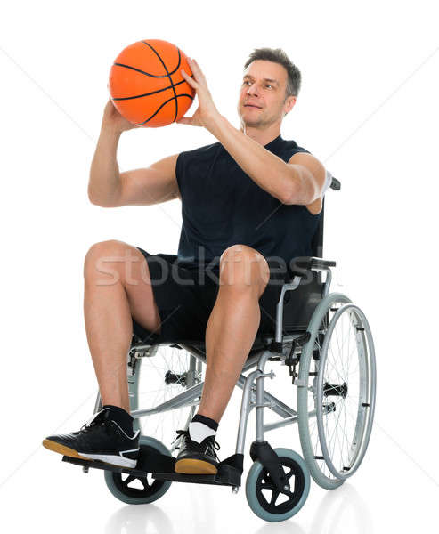 Handicapped Man On Wheelchair Working Out With Dumbbell Stock photo © AndreyPopov