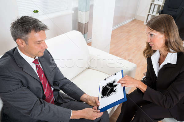 Psychologist Showing Rorschach Inkblot Picture To Patient Stock photo © AndreyPopov
