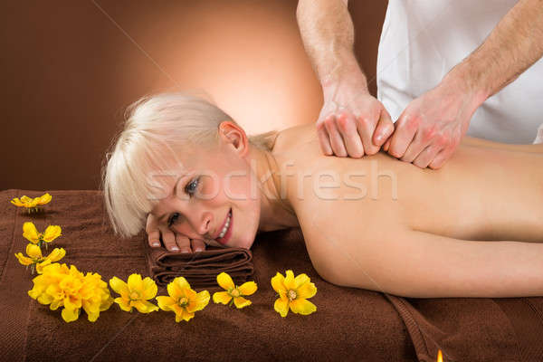Młoda kobieta masażu portret kobieta sportu Zdjęcia stock © AndreyPopov