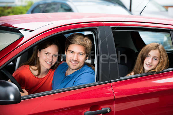 Couple séance nouvellement voiture heureux fille Photo stock © AndreyPopov