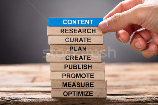 Hand Building Content Concept With Wooden Blocks Stock photo © AndreyPopov