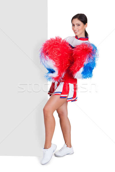 Cheerleader Standing Near Blank Placard Stock photo © AndreyPopov