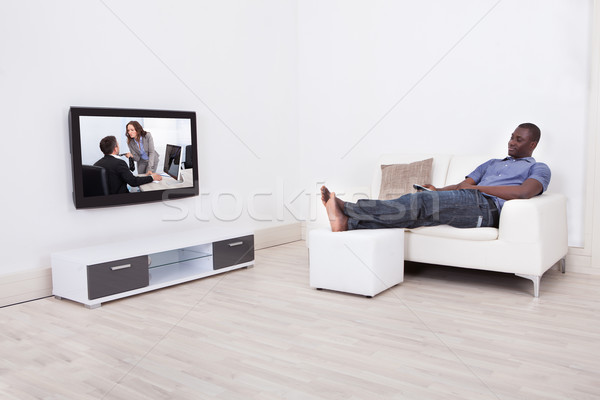 Man Watching Movie Stock photo © AndreyPopov