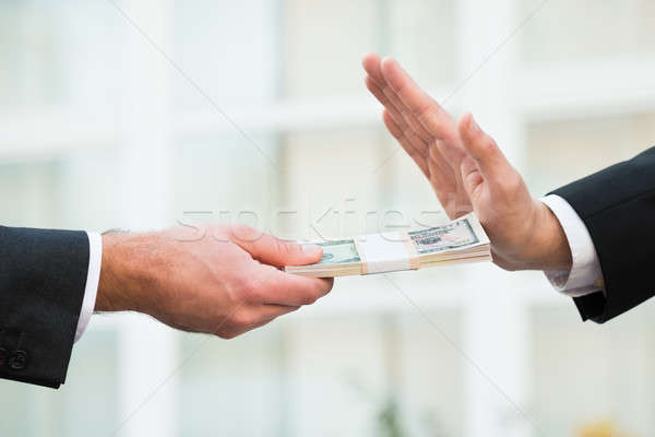 Businessman Refusing To Take Bribe From Partner Stock photo © AndreyPopov