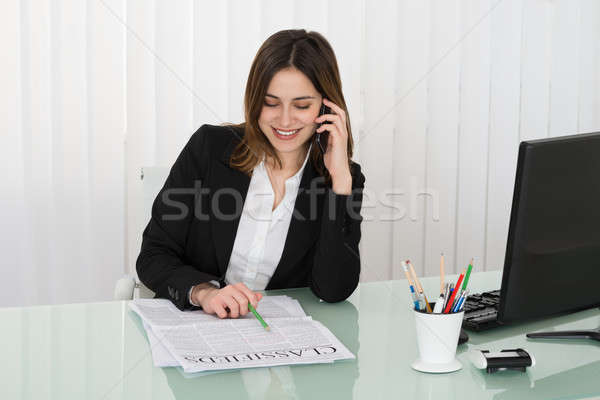Businesswoman Talking On Cellphone Stock photo © AndreyPopov